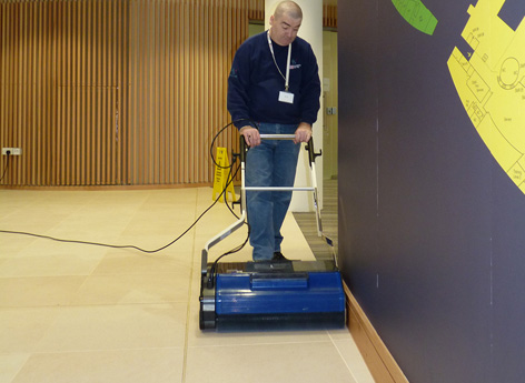 Edge cleaning capability of the Duplex 620 Industrial floor machine.