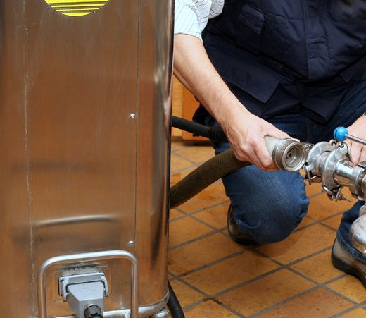 Image showcasing the integration capability of a cleaning system, designed for seamless connection to existing bottling lines or pressure washers.