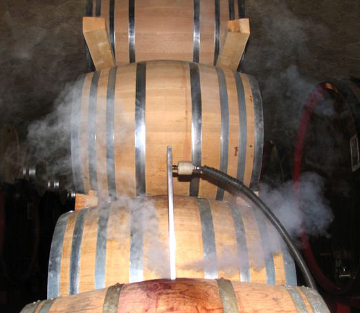 Image showing the process of vapourisation inside a wine barrel as part of the Wine Barrel Cleaning System, for deep cleaning and sterilisation.
