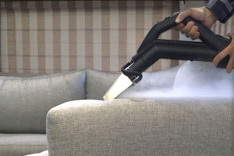 Image depicting the use of Duplex's steam cleaning and vacuuming solutions for upholstery in caravan park accommodations.