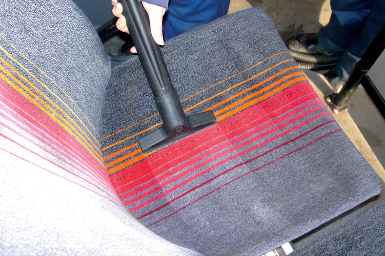 Image showcasing the use of a contact cleaner for meticulous car detailing, ensuring a spotless and refreshed interior.