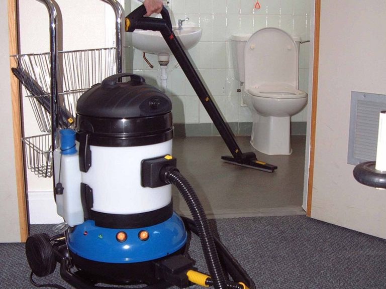 Image showcasing the quick and efficient bathroom cleaning process in a dental clinic, ensuring top-level hygiene and cleanliness.