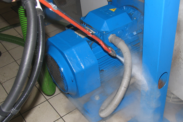 Image showing the use of high-pressure steam cleaning for removing grime and bacteria from air conditioner coils and fins, ensuring thorough sanitization.