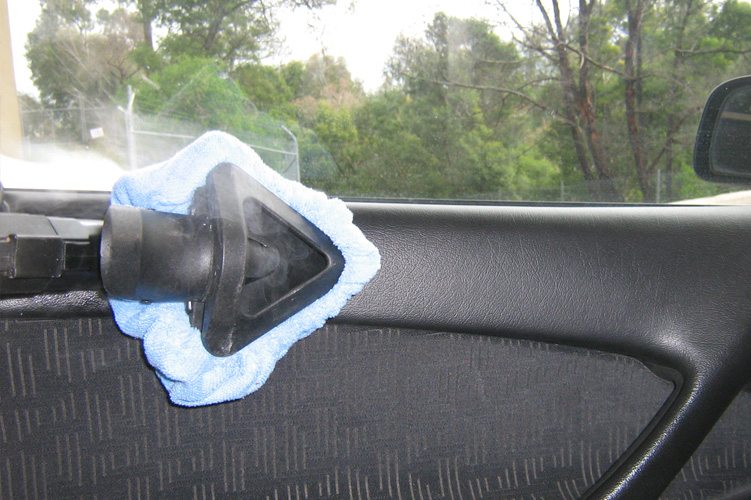 Image showcasing Duplex's car steam cleaning technology, ideal for effectively cleaning door panels in vehicles.