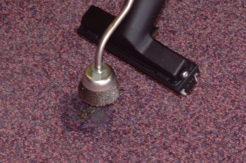 Image displaying Duplex Cleaning Machines' efficient solutions for removing chewing gum from floors and carpets in cinema and theatre environments.