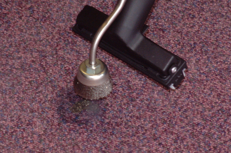 Image displaying Duplex Cleaning Machines' efficient solutions for removing chewing gum from floors and carpets in cinema and theatre environments.