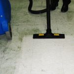 Image showing the use of Duplex steam cleaning machines for efficiently removing grease from kitchen floors.