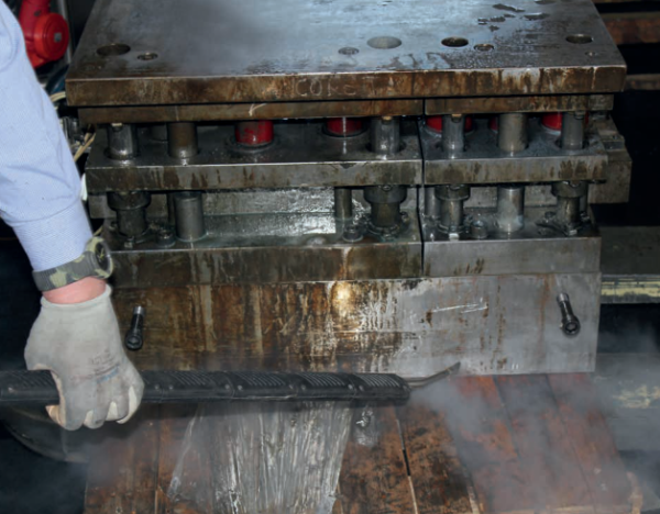 Image depicting the use of powerful cleaning and degreasing solutions in a factory setting, targeting heavy industrial grime.