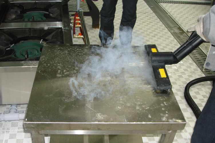 Image depicting the Jetvac Maxi being used for efficient sanitisation of equipment in an ice cream production facility, ensuring functional and hygienic operations.
