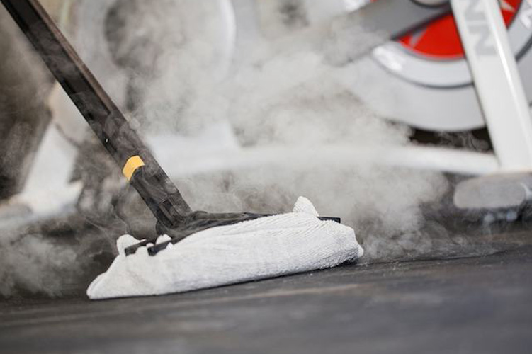 Image showcasing Duplex Cleaning Machines' equipment, adept at cleaning various surfaces including hard floors, safety floors, and carpets in sports and fitness environments.