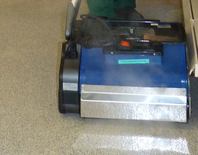 Image showing the effective cleaning of hard floor areas, like corridors, in a veterinary clinic using Duplex Cleaning Machines.