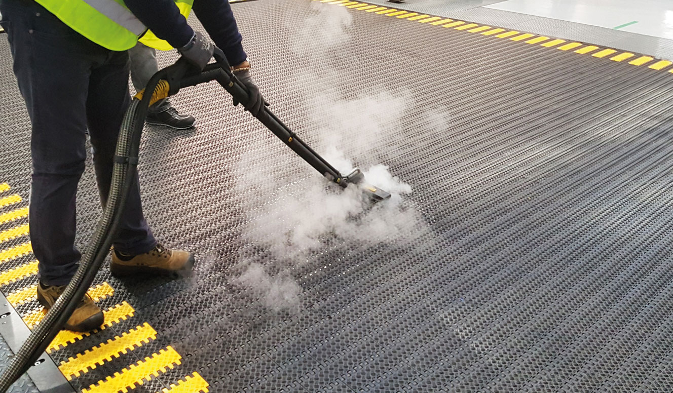 Entrepreneurs launching an industrial cleaning service with Duplex Cleaning Machines' advanced technology.