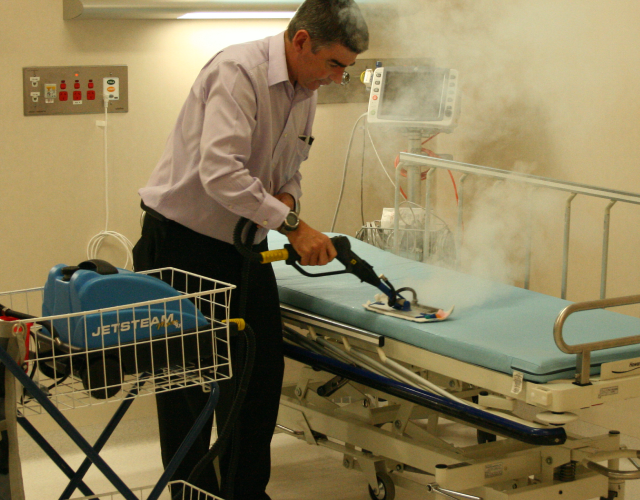 Sanitising a mattress in an aged care facility with JetSteam to remove odours and disinfect without chemicals.