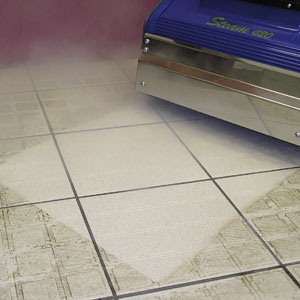 Duplex 420 floor cleaner removing dirt from tile flooring using steam.