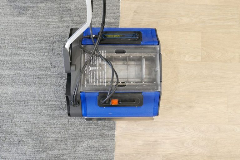 Duplex machine cleaning transition area between carpet and hard floor surface.